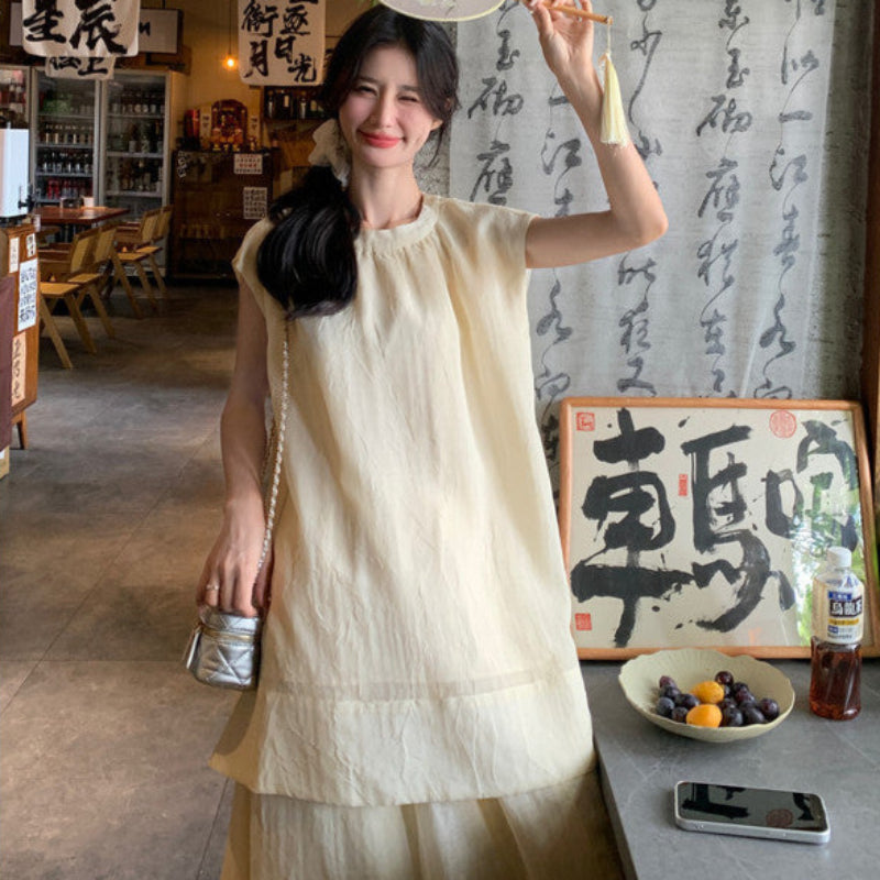 ノースリーブカットソー×ロングスカートスーツ