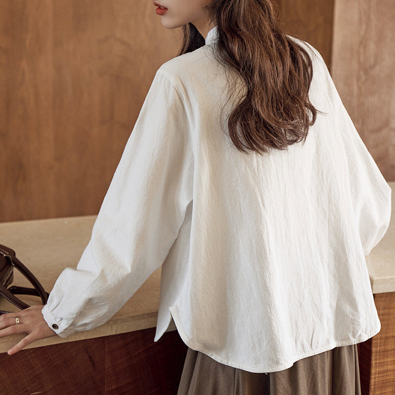 ボタンデザインスタンドカラーブラウス