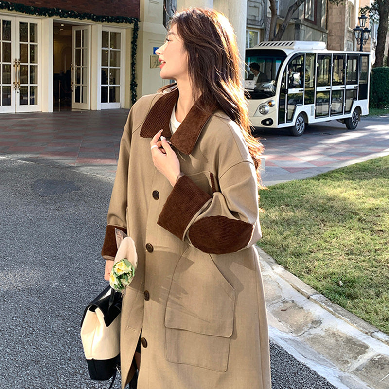 オーバーサイズバイカラーミディ丈トレンチコート