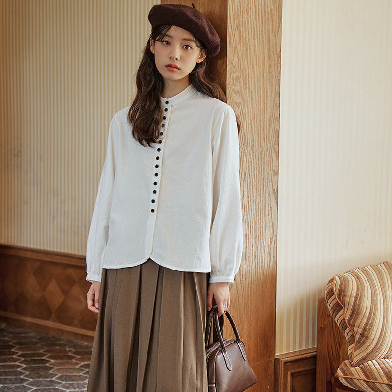 ボタンデザインスタンドカラーブラウス
