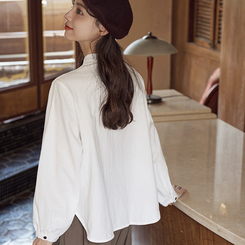 ボタンデザインスタンドカラーブラウス