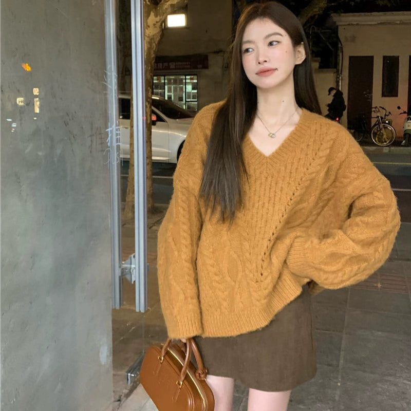 オーバーサイズVネックケーブルニット