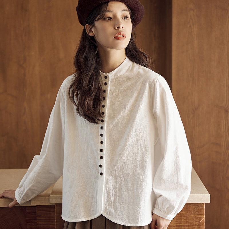 ボタンデザインスタンドカラーブラウス